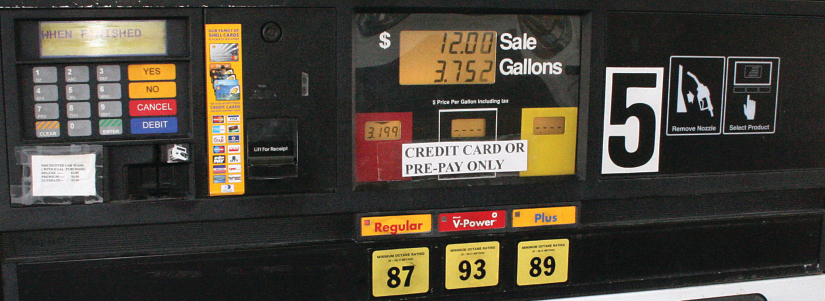 An image of a gas pump that reads “$12.00 Sale, 3.752 Gallons”.