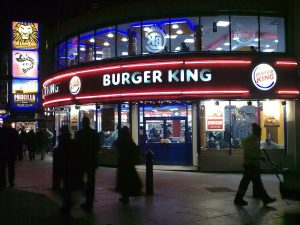 Outside view of Burger King in London at night.