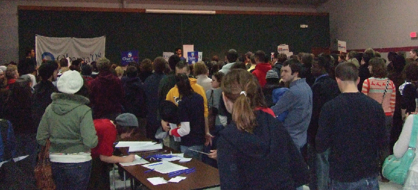 An image of a group of people standing in a room.