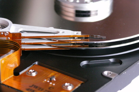 A photo of the read mechanism of a hard drive.