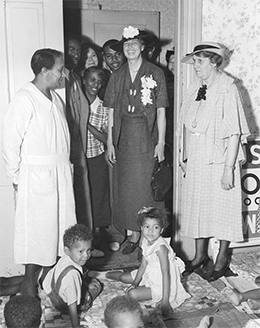 A photograph shows Eleanor Roosevelt visiting a WPA nursery school, surrounded by a small group of adults and several children.