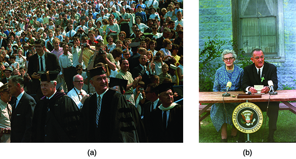 Photograph (a) shows President Johnson in academic regalia, standing alongside a crowd at the University of Michigan. Photograph (b) shows Johnson speaking while seated at a table beside an elderly woman; both have small microphones in front of them.