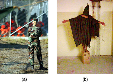 Photograph (a) shows a group of handcuffed detainees behind a fence; a uniformed soldier in the foreground stands watching them. Photograph (b) shows a man wearing a large piece of fabric, with a hood covering his face; he is being forced to balance on a small box with his arms held out to his sides.