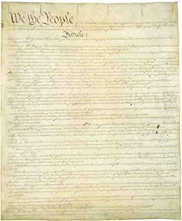 The first page of the U.S. Constitution is shown.