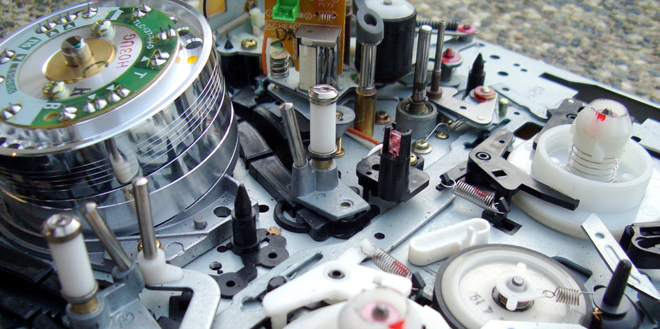 Photograph of the electronic components of playback heads used with audio and video magnetic tapes.
