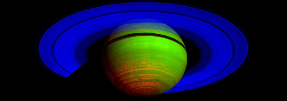 An image of Saturn seen in infrared. The rings are shown in blue, and the planet sphere is mostly green with some red at the bottom and a black ring around the upper top of the sphere.