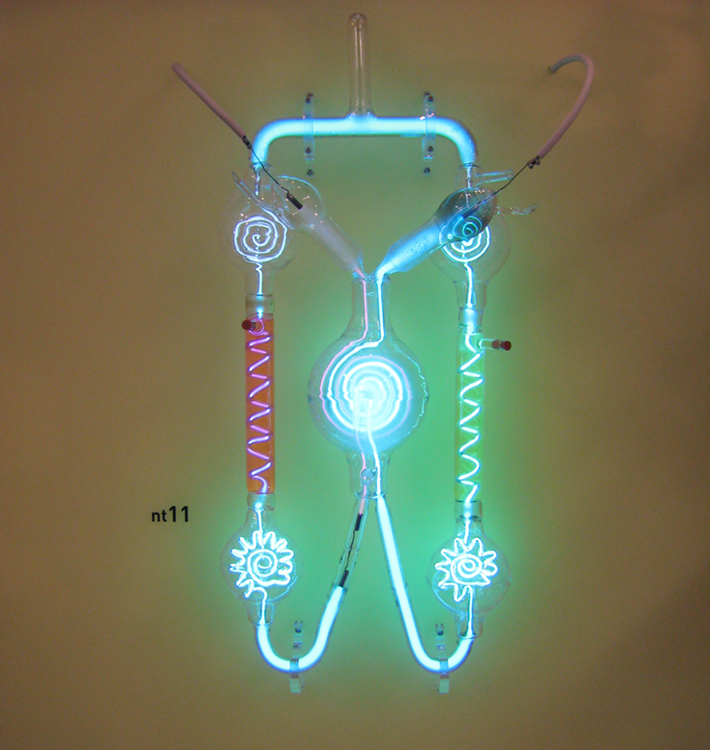 Image of a gas discharge tube consisting of a glass vacuum tube containing two metal electrodes and a low-pressure gas to create light.